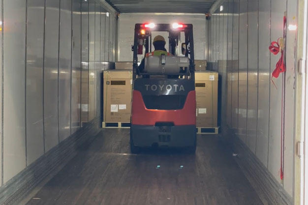 Afar Logistics warehouse and Transloading forklift inside trailer